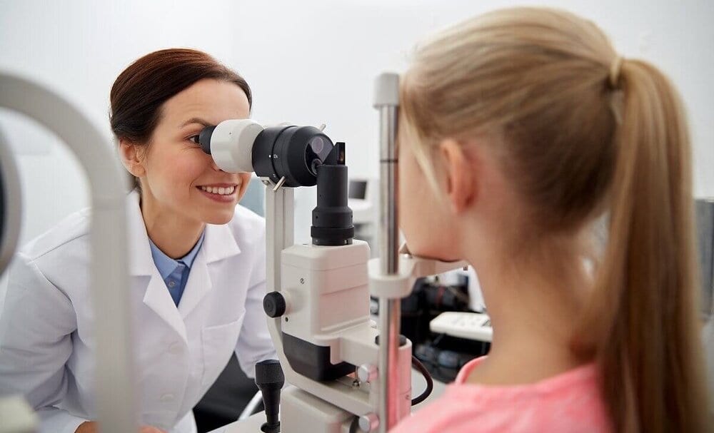 child at an eye exam